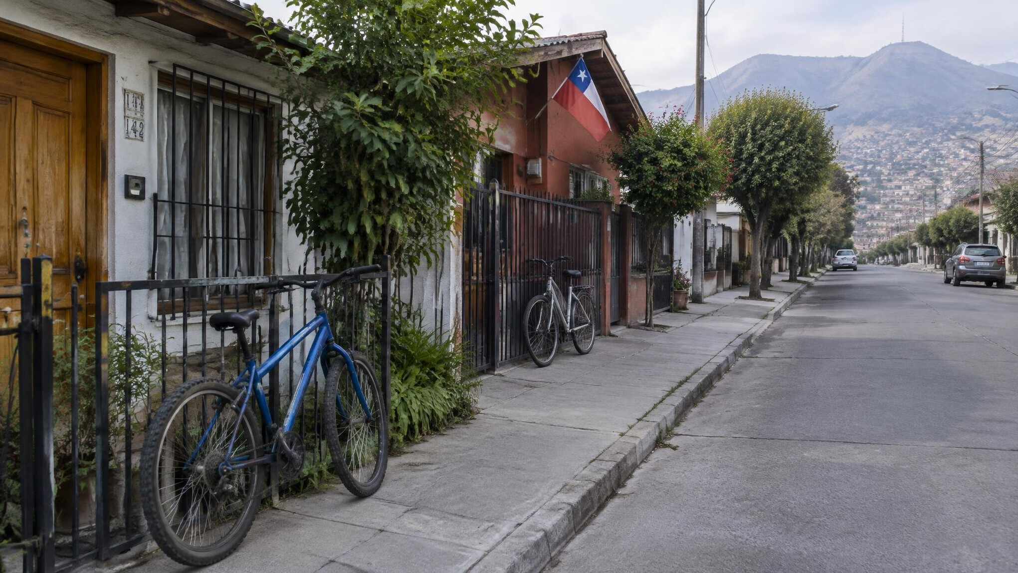 Quiet residential street with parked bicycles
